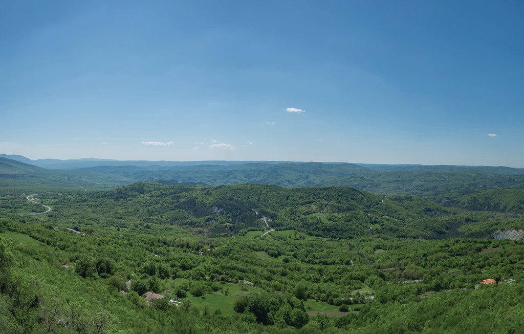 Unusual house in a forest on a glade with panoramic view